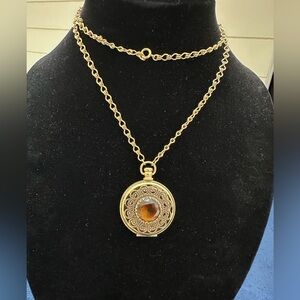 83- Avon Elegant Gold Locket Pendant Amber color stone Necklace 28” chain